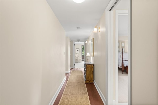 hallway featuring hardwood / wood-style flooring