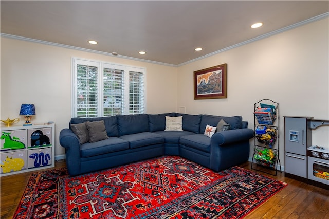 living room with hardwood / wood-style floors and ornamental molding