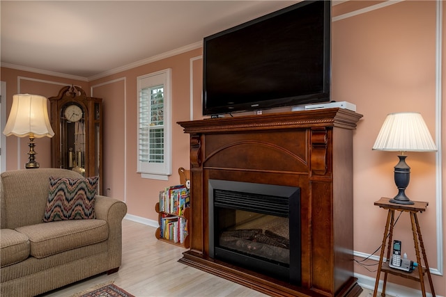 living room featuring light wood-type flooring and crown molding