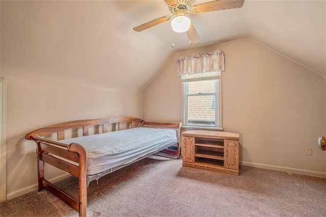 carpeted bedroom with lofted ceiling and ceiling fan