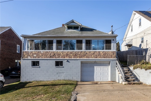 view of front of house with a garage