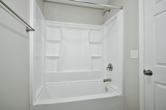 bathroom with shower / tub combination