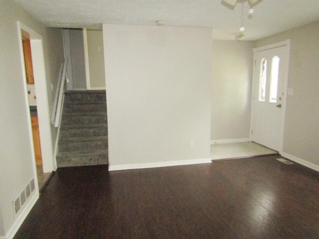 205 Wheatfield Dr, Hempfield Twp Wml, PA 15601 - entryway with wood finished floors, stairway, baseboards, and ceiling fan