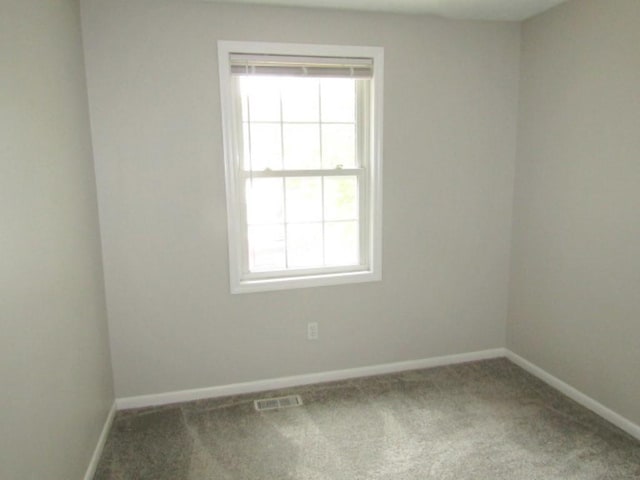 205 Wheatfield Dr, Hempfield Twp Wml, PA 15601 - carpeted spare room featuring baseboards