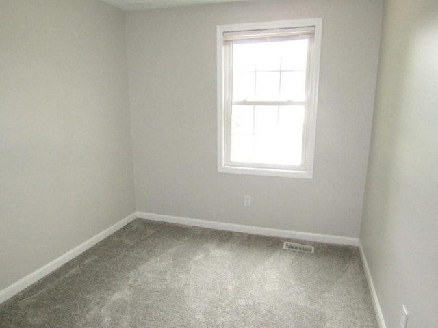205 Wheatfield Dr, Hempfield Twp Wml, PA 15601 - carpeted spare room with baseboards