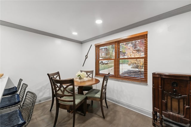 dining area featuring ornamental molding