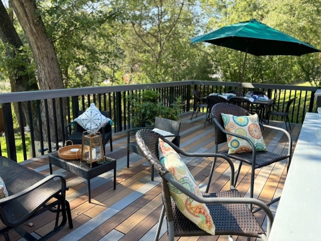 wooden deck featuring outdoor lounge area