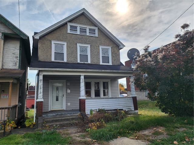 view of front of home featuring covered porch