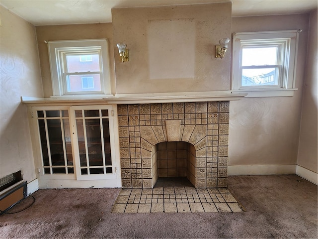 unfurnished living room with carpet flooring