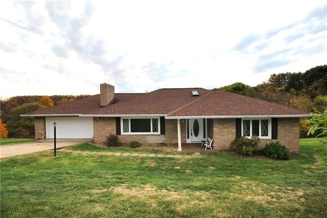 ranch-style home featuring a garage and a front lawn