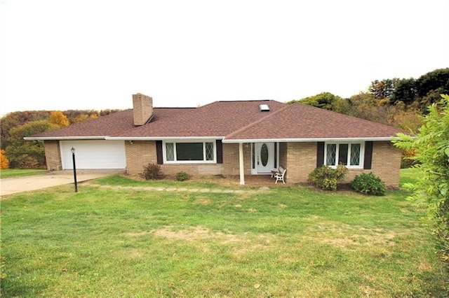 ranch-style house with a garage and a front yard