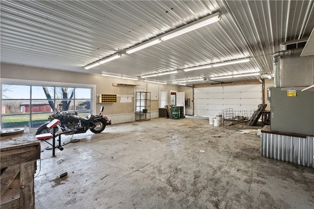 garage featuring heating unit