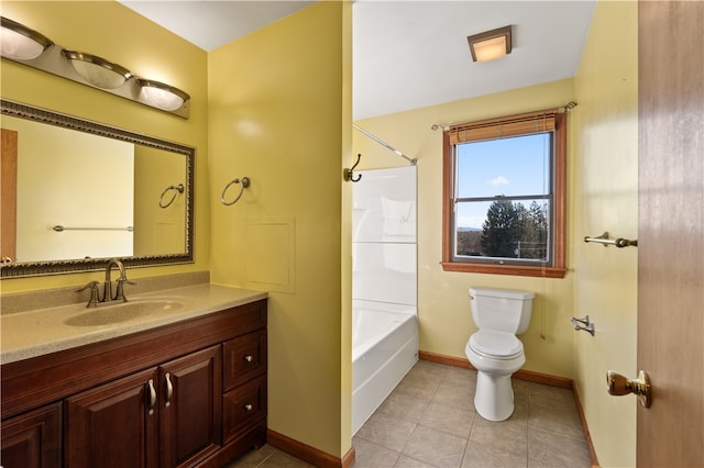 full bathroom featuring toilet, tub / shower combination, vanity, and tile patterned flooring