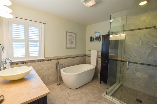 532 W Sunbury Rd, Center Twp But, PA 16001 - bathroom featuring tile patterned floors, vanity, tile walls, and shower with separate bathtub