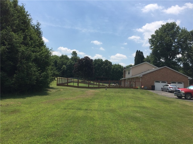 532 W Sunbury Rd, Center Twp But, PA 16001 - view of yard with a garage