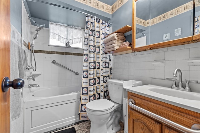 bathroom with toilet, backsplash, shower / bath combination with curtain, vanity, and tile walls