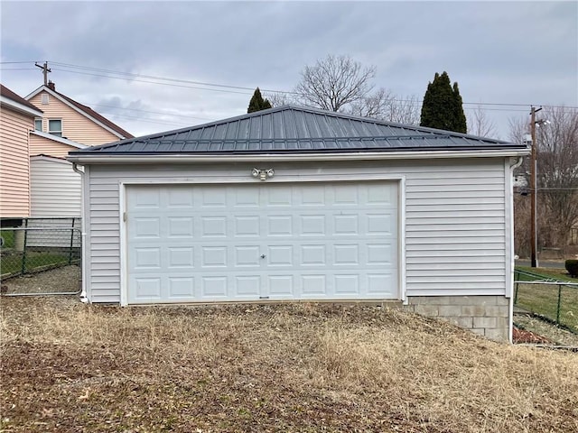 detached garage with fence