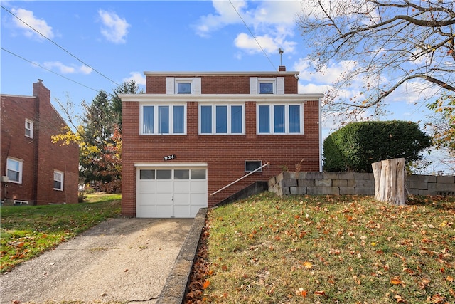 view of side of property with a garage