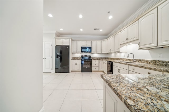 kitchen featuring white cabinets, black appliances, sink, crown molding, and light stone countertops