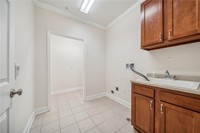 washroom with sink, washer hookup, light tile patterned floors, hookup for an electric dryer, and crown molding