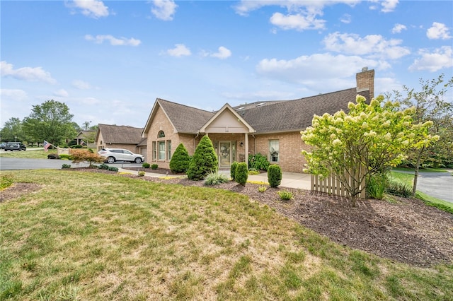 view of front of home with a front lawn