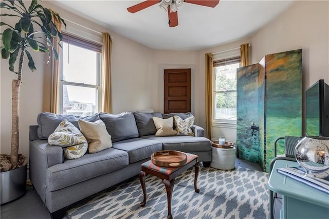 living room featuring ceiling fan