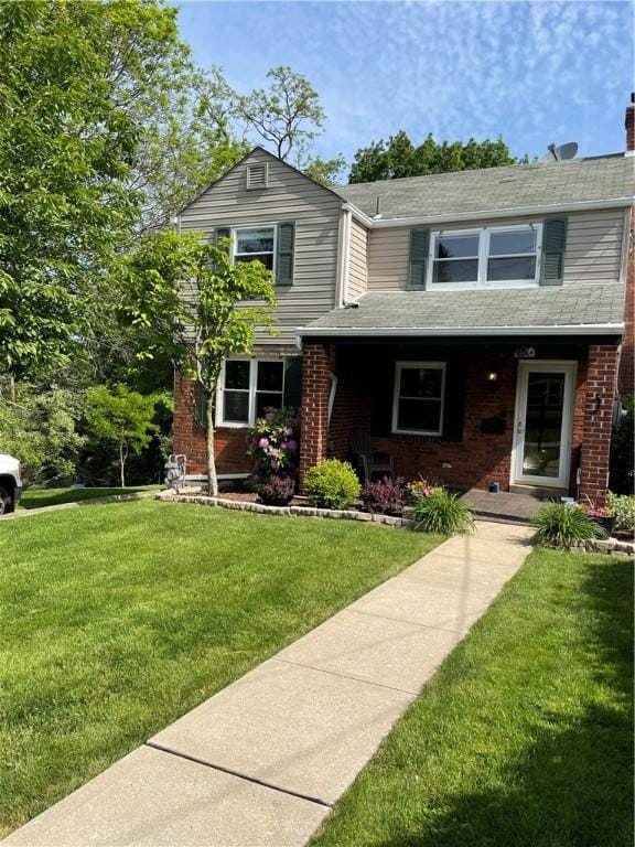 view of front property with a front lawn