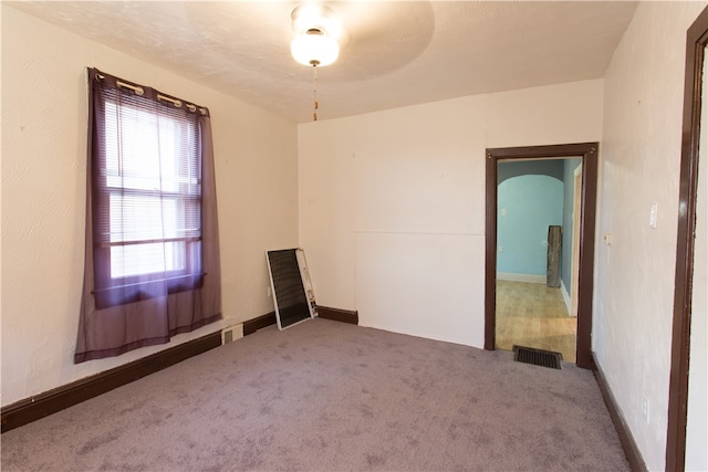 view of carpeted spare room