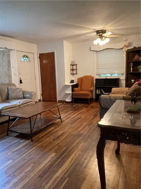 living room with hardwood / wood-style floors and ceiling fan