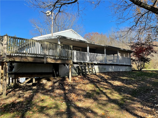 view of home's exterior featuring a deck