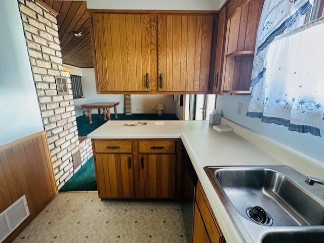 kitchen featuring sink and kitchen peninsula