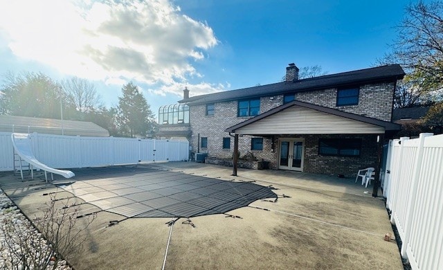 rear view of house featuring a patio area