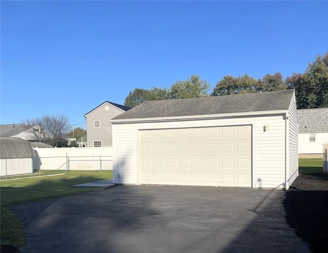 garage with a yard