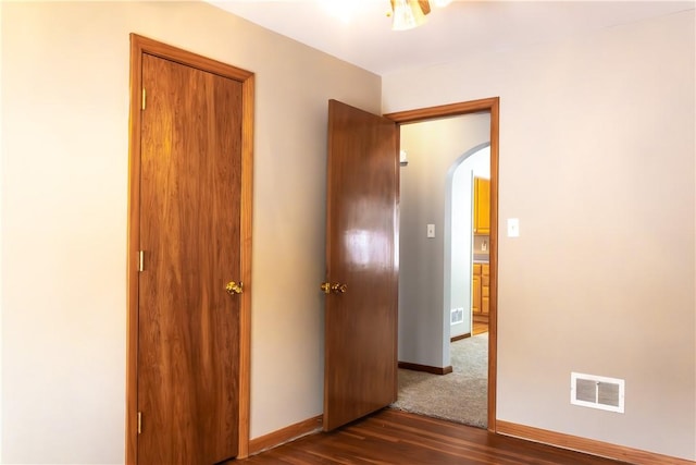 interior space featuring dark wood-type flooring