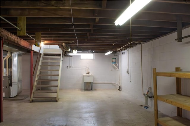 basement featuring heating unit