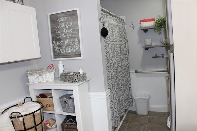 bathroom with a shower with curtain