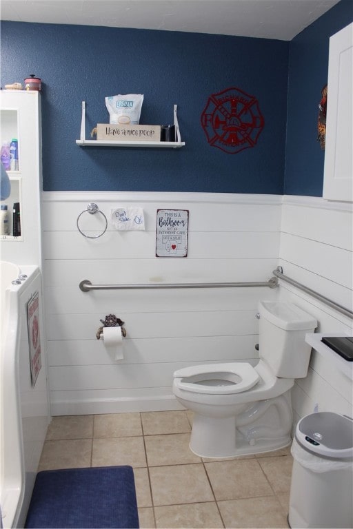 bathroom featuring toilet and tile patterned floors