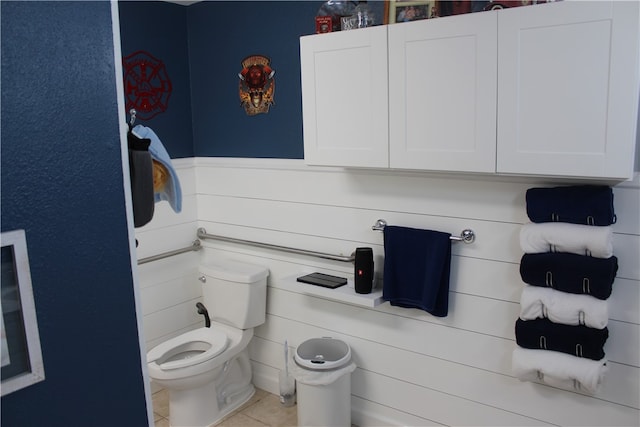 bathroom featuring tile patterned floors and toilet