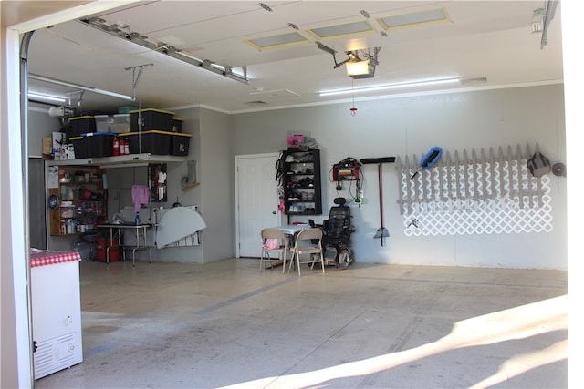 garage featuring a garage door opener