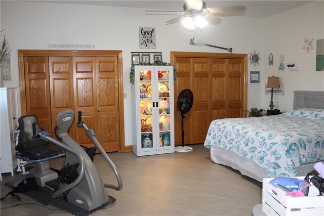 bedroom with a closet, light wood-type flooring, and ceiling fan