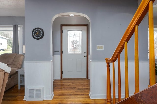 foyer with light hardwood / wood-style flooring