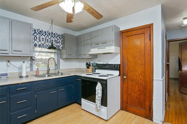 kitchen featuring ceiling fan, sink, white electric stove, light hardwood / wood-style floors, and a textured ceiling