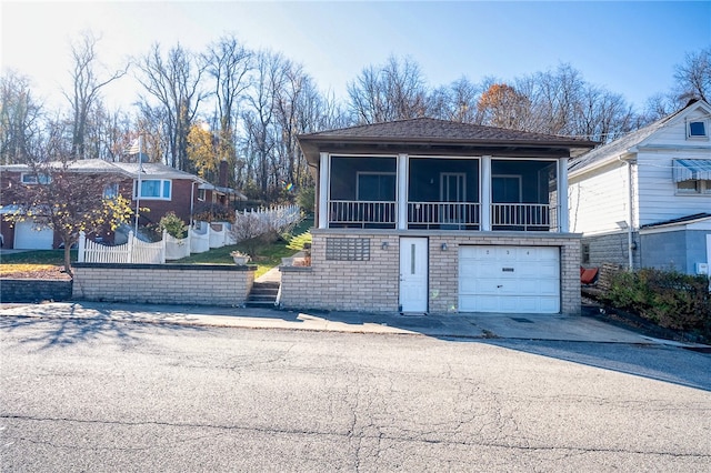 view of front of home with a garage