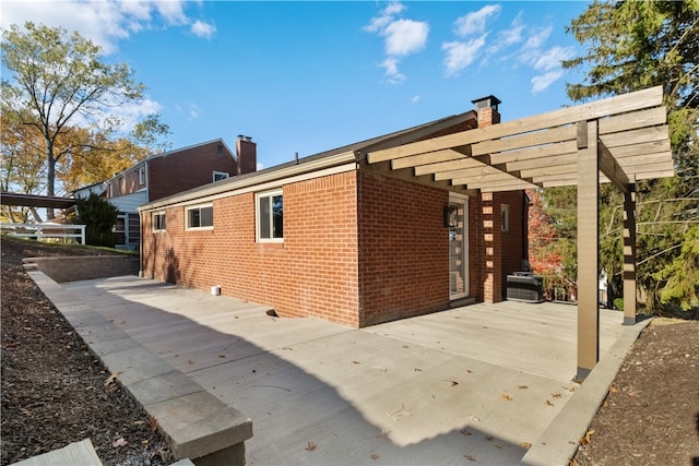 view of home's exterior featuring a patio area