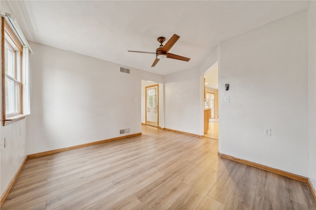 unfurnished room featuring light hardwood / wood-style flooring and ceiling fan