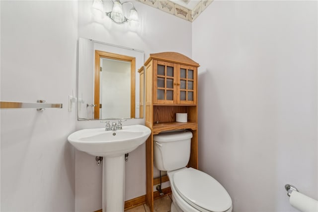 bathroom with sink and toilet