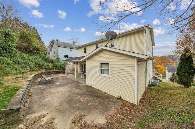 rear view of house featuring a patio area