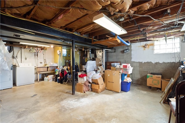 basement featuring washer and dryer