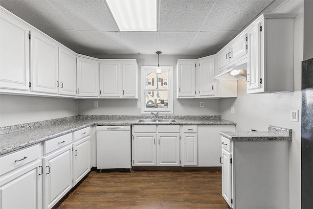 kitchen with white cabinetry and white dishwasher