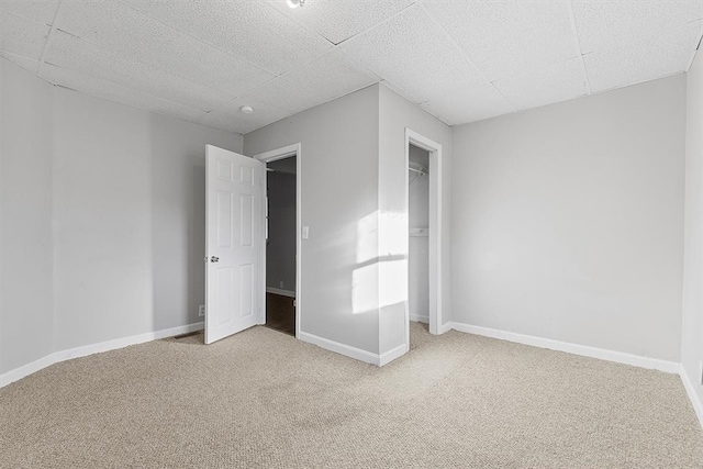 unfurnished bedroom featuring light colored carpet